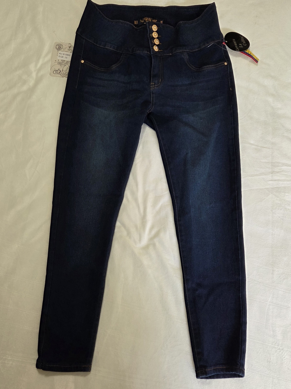 High-Rise Dark Blue Stretch Jeggings with Button-Fly Detail